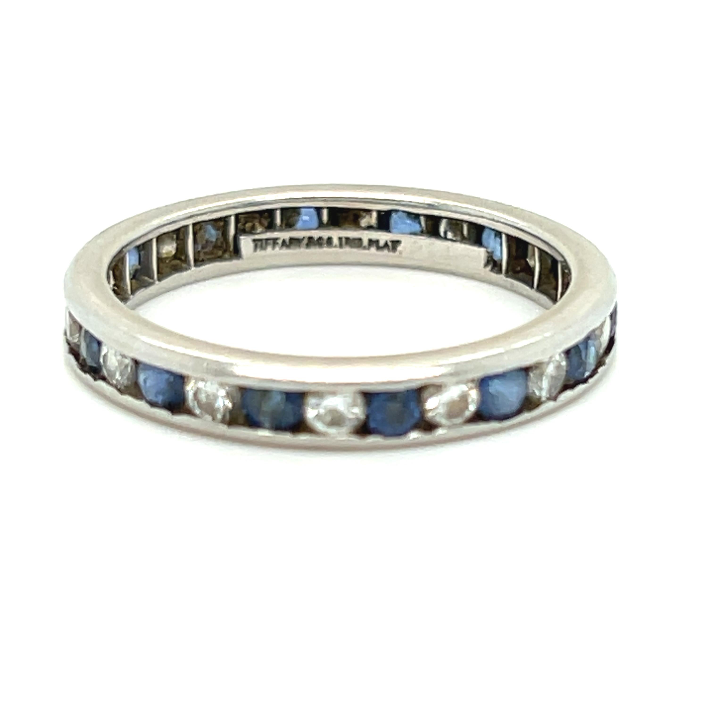 Another classic Tiffany design. This high quality Vintage Sapphire and Diamond Ring would make a great stackable or wedding band today. Crafted in Platinum by Tiffany & Co in the 1990's, the design features Alternating Channel Set Sapphires and