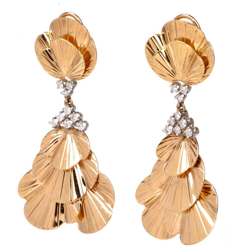 These exquisite estate Tiffany & Co. earrings are crafted in 14K yellow gold and weigh 31.5 grams.  Inspired by the Iberian style of chandelier earrings these Tiffany & co. earrings incorporate an assemblage of graduated fan shape profiles rendered