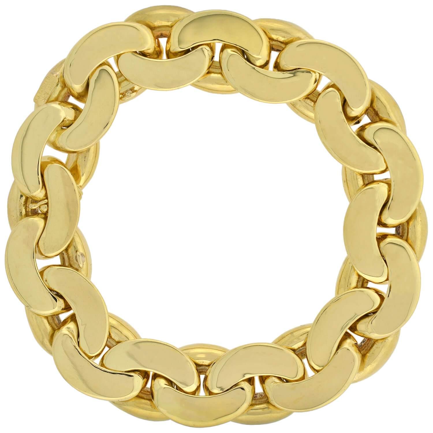 This stunning and unusual Vintage reversible two-tone bracelet from the 1980's is by legendary designer Tiffany & Co.! Crafted in vibrant 18kt yellow and white gold, this double-sided piece is comprised of oval-shaped links that form a classic Cuban