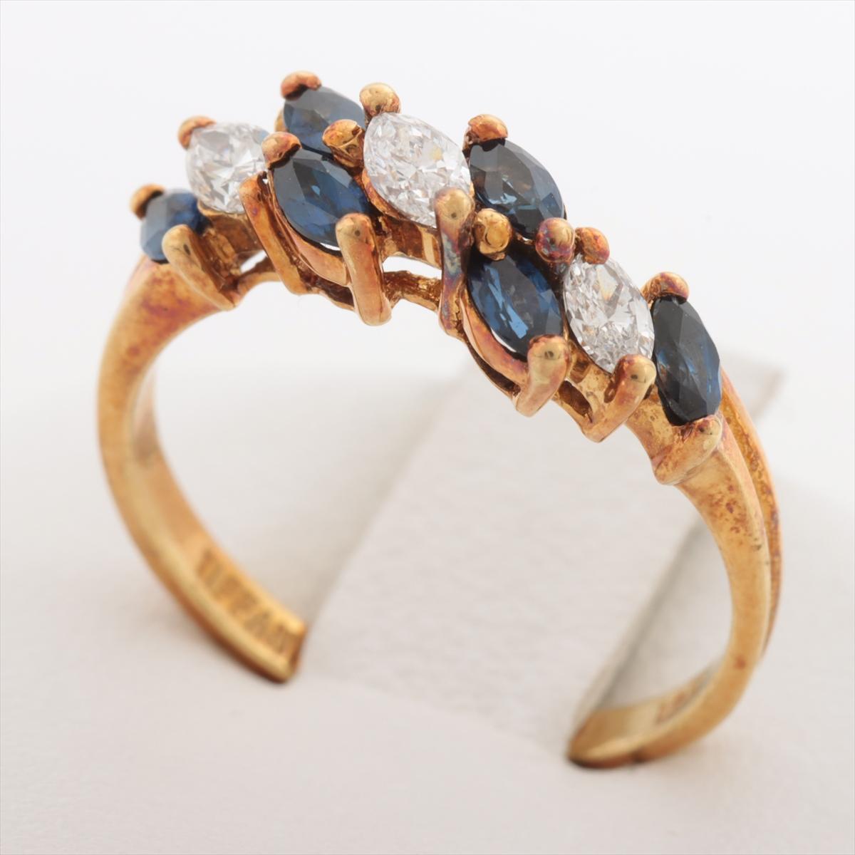 Die Tiffany & Co. Der Vintage Small Sapphire and Diamond Ring in Gold ist ein exquisites und zeitloses Schmuckstück, das den Charme von Vintage-Schmuck einfängt. Der Ring besteht aus einer zarten Kombination von Saphiren und Diamanten, die in ein