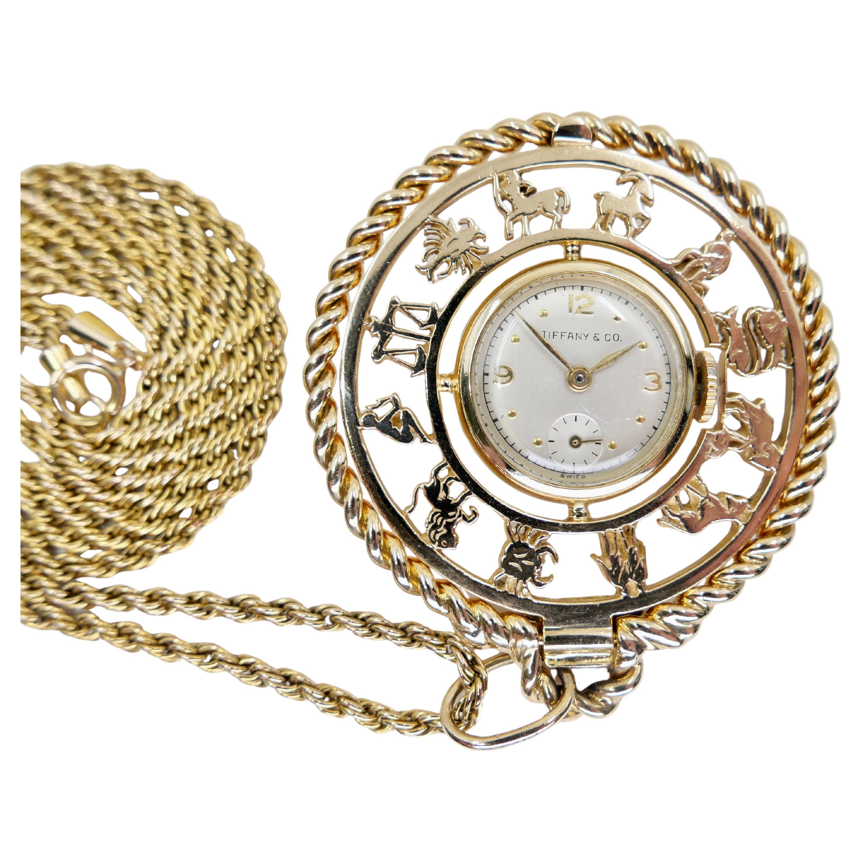 Tiffany 
Co. Vintage Solid 14k Zodiac Pendant Watch Movement by Concord. 1960
s