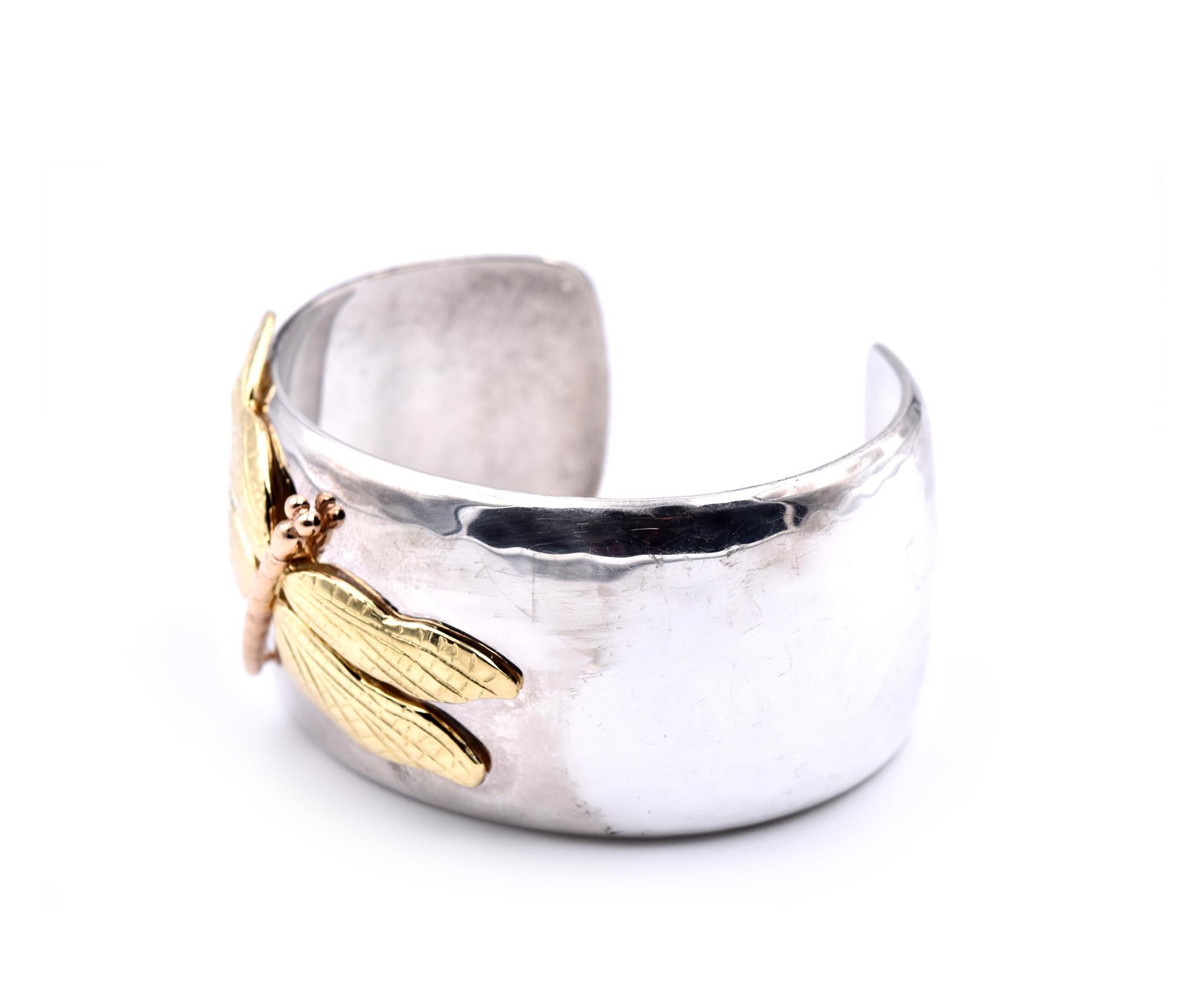 Designer: Tiffany & Co
Material: sterling silver, 18k two-tone gold
Dimensions: cuff will fit a 6-inch wrist and it is 34mm wide
Weight: 79.19 grams

