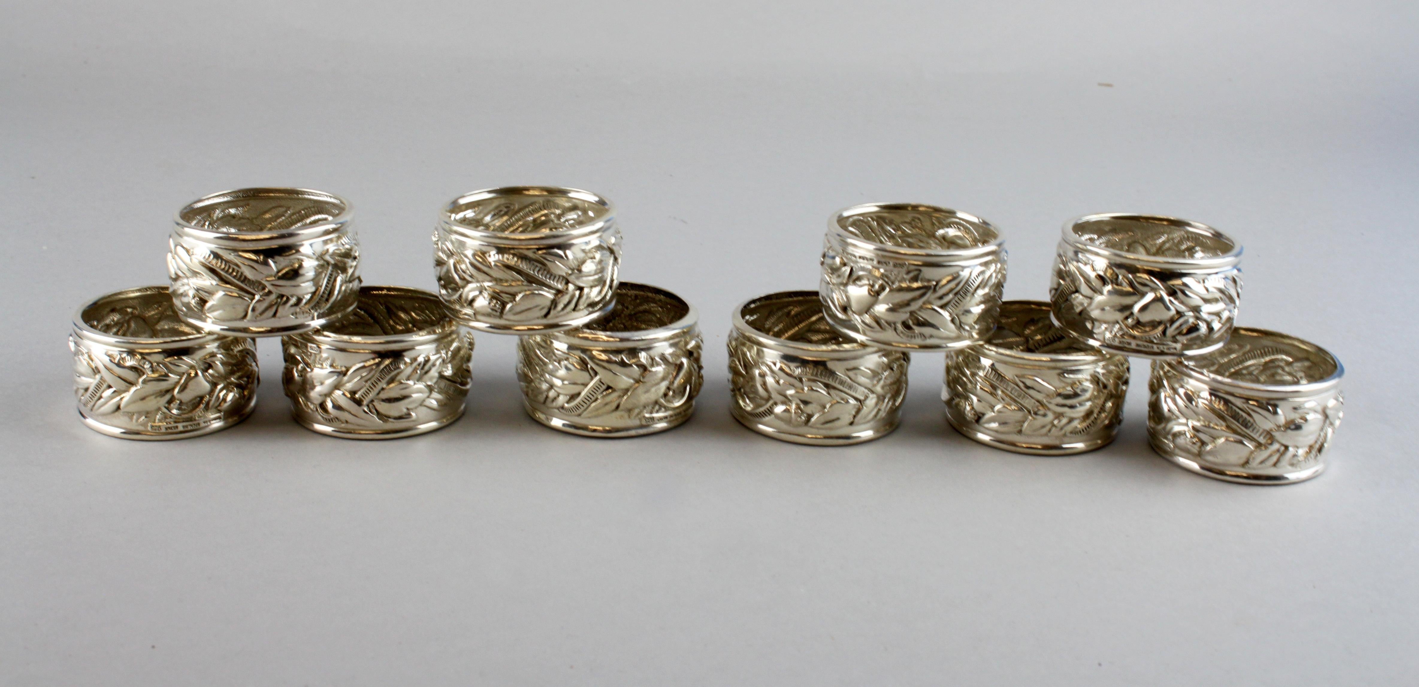 Vintage sterling silver set of 10 napkin rings.
Maker: Tiffany & Co.
Made in New York, circa 1980s
Fully hallmarked.

Dimensions:
Diameter x height 4.8 x 2.75 cm
Weight: 295 grams total

Condition report: Napkin rings are pre-owned, minor