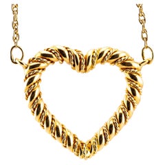 Tiffany & Co Vintage Twist Rope Heart Pendant Necklace in Yellow Gold Circa 1980