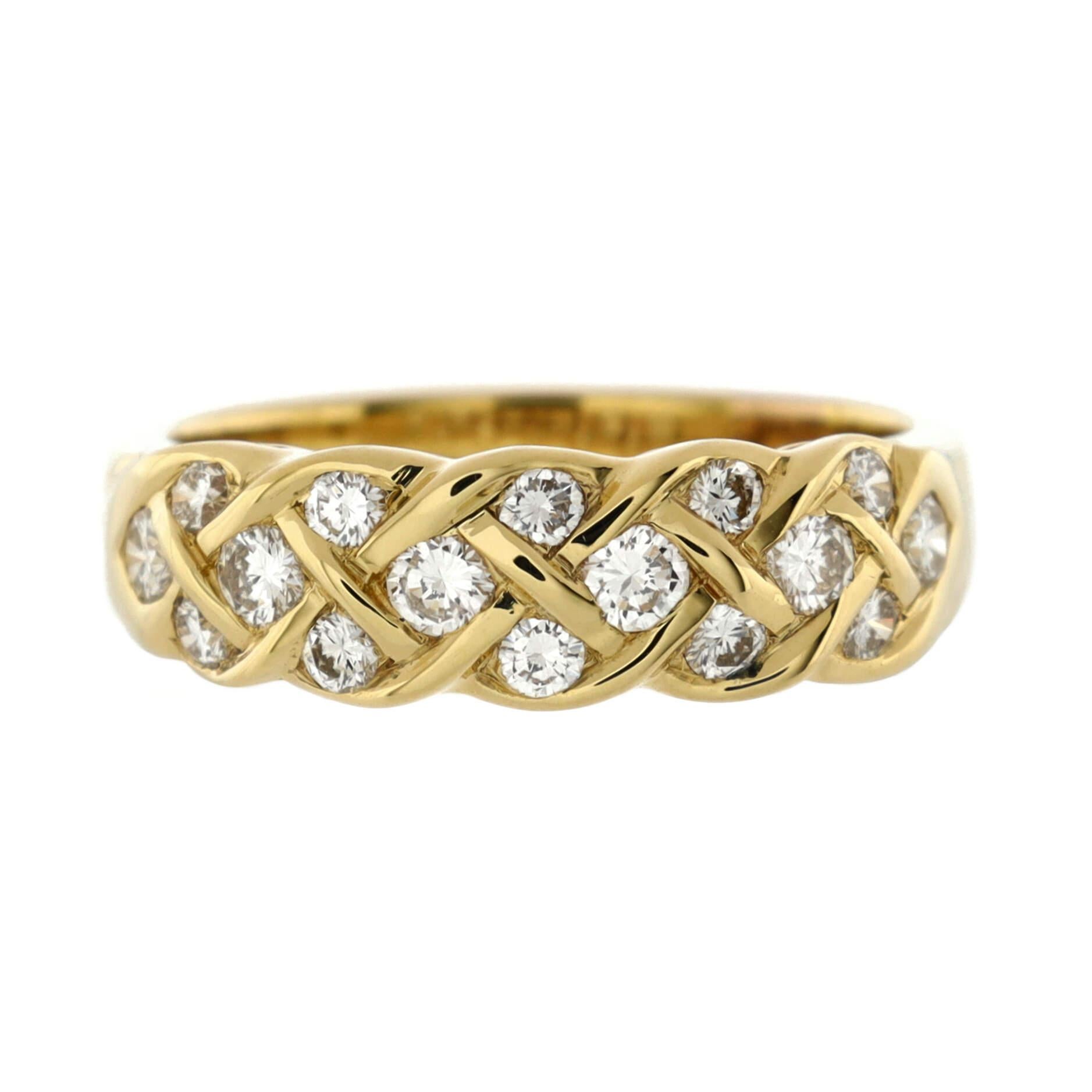 Condition: Moderately heavy wear and re-polishing throughout. This has been sized not to brand standards.
Accessories: No Accessories
Measurements: Size: 5.75 - 51, Width: 3.50 mm
Designer: Tiffany & Co.
Model: Vintage Woven Band Ring 18K Yellow