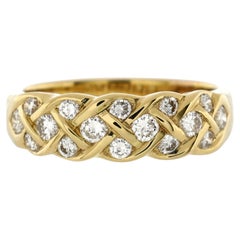 Tiffany & Co. Anello a fascia intrecciata vintage in oro giallo 18 carati con diamanti