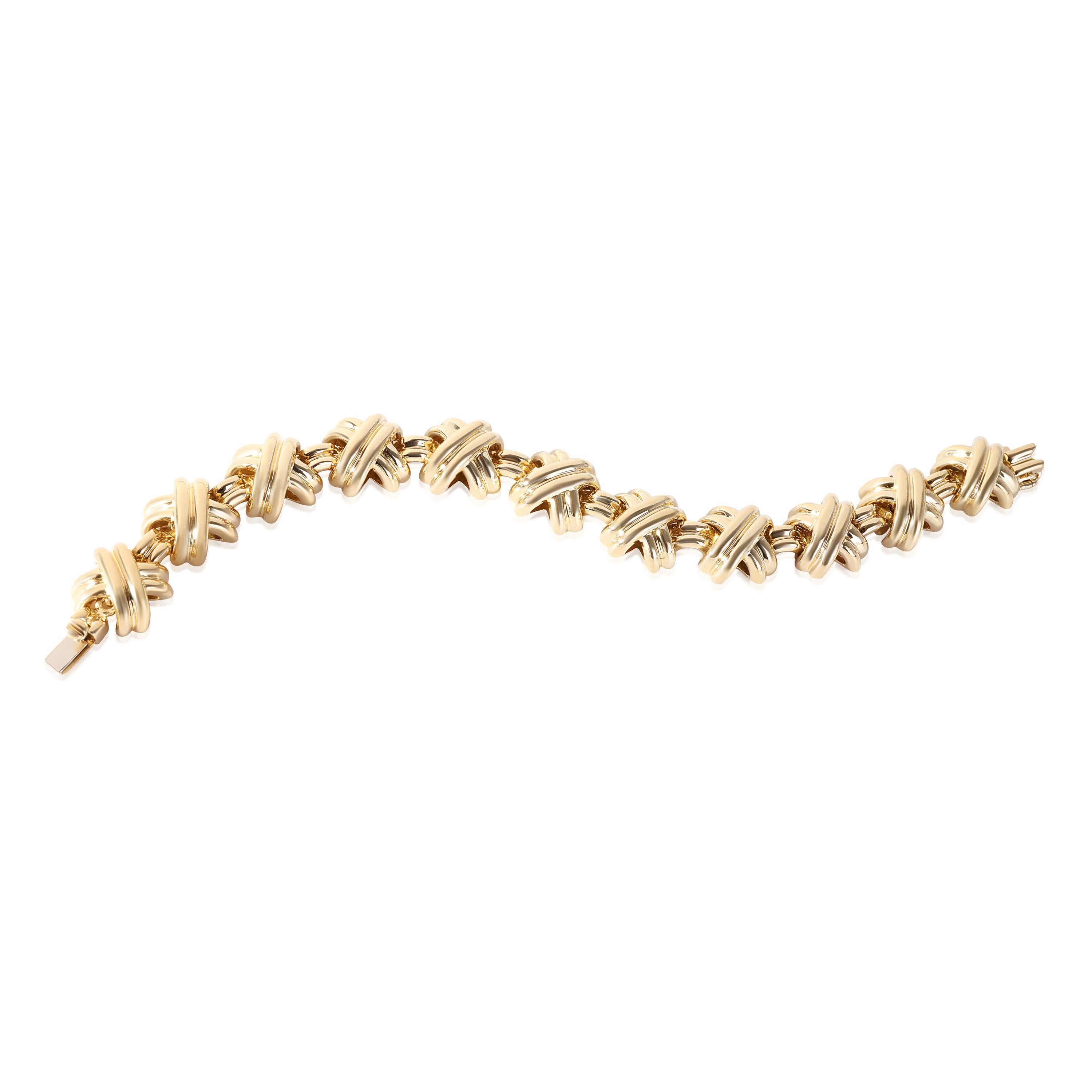 Tiffany & Co. Vintage X Bracelet in 18k Yellow Gold

PRIMARY DETAILS
SKU: 119153
Listing Title: Tiffany & Co. Vintage X Bracelet in 18k Yellow Gold
Condition Description: Retails for 15,000 USD. In excellent condition and recently polished. 7.25