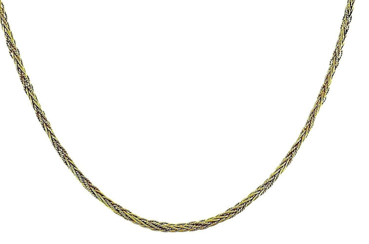 Gorgeous long 18k yellow gold chain necklace by Tiffany & Co. Vintage (c.1970s) wheat link chain, featuring textured and polished gold threads. 
Stamped with Tiffany & Co. maker's mark, a hallmark for 18k gold and a country of origin
