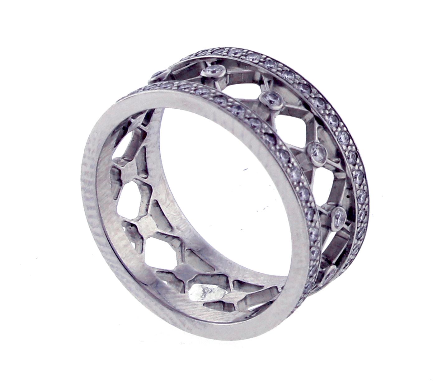 From Tiffany & Co.'s Viole collection, thier distinctive viole band-ring.  The platinum ring boasts .53 carats of diamonds. The ring is 8mm wide and is size 6. In the original box, excellent condition