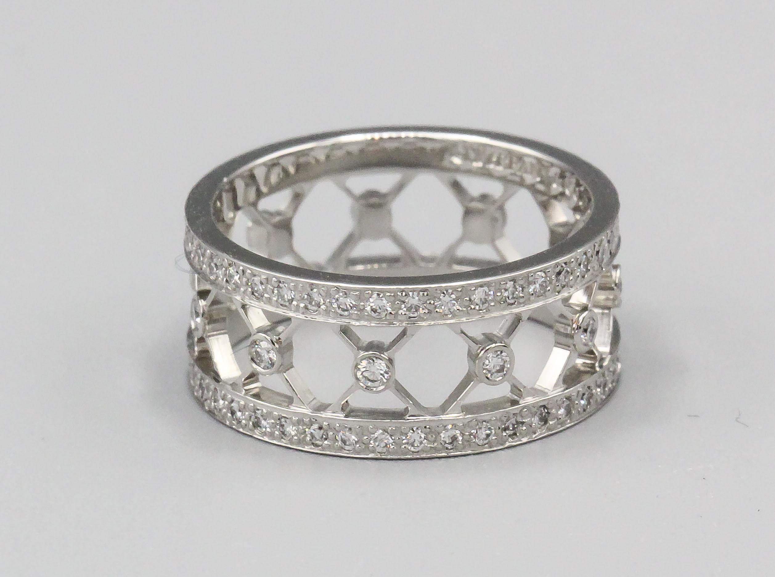 Elegance finds a new expression in this exquisite Tiffany & Co. Diamond and Platinum Band from the 
