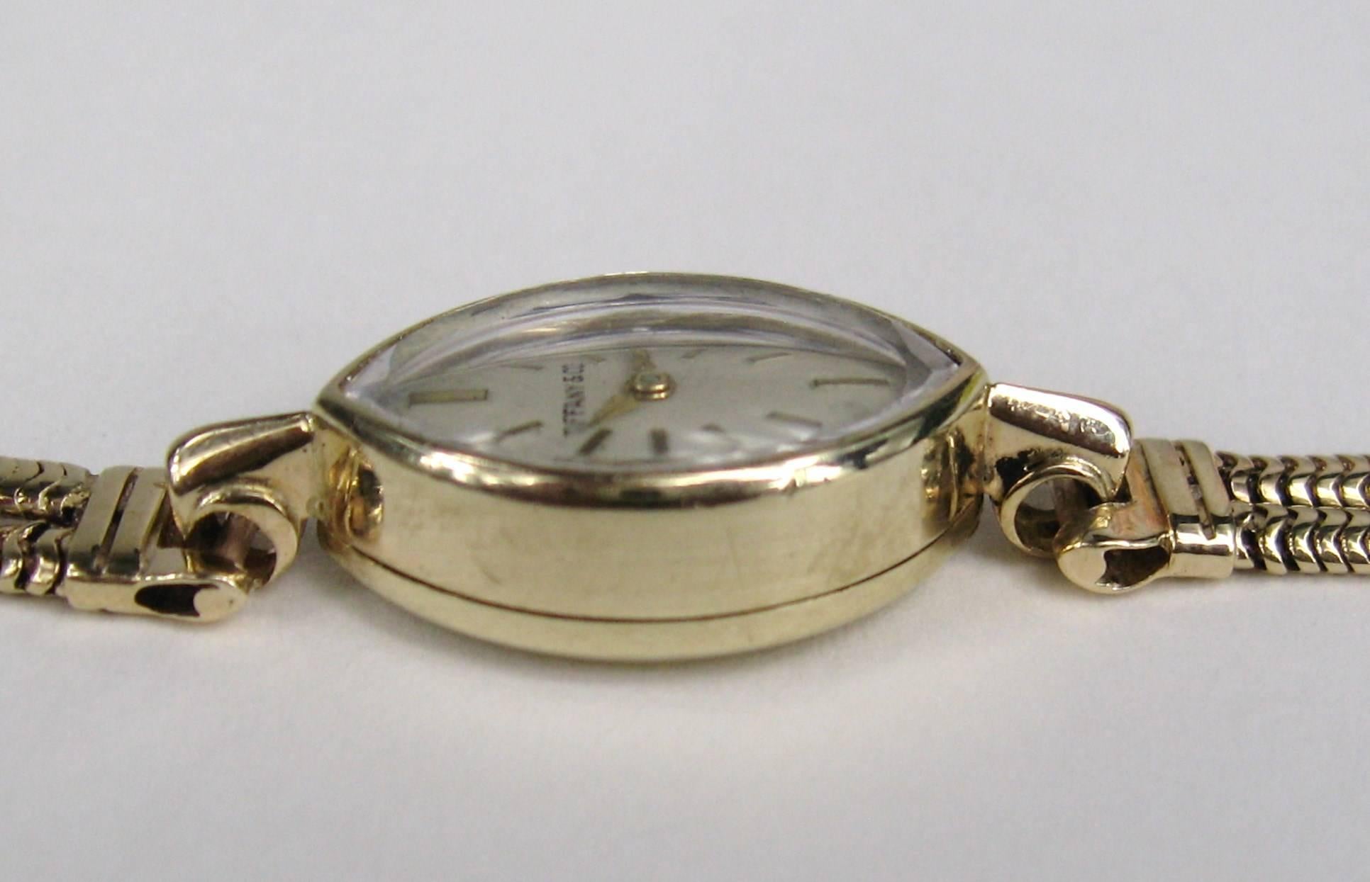 gold oval watch