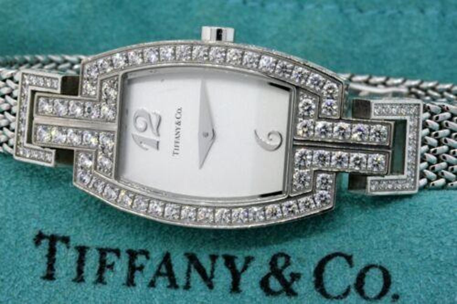 Here we have a solid 18k white gold ladies Tiffany & Co. watch completely adorned in diamonds. This one is a rare vintage treasure you certainly won't see many like this around. Diamonds surround the bezel, case, and lugs of the watch. And at 60