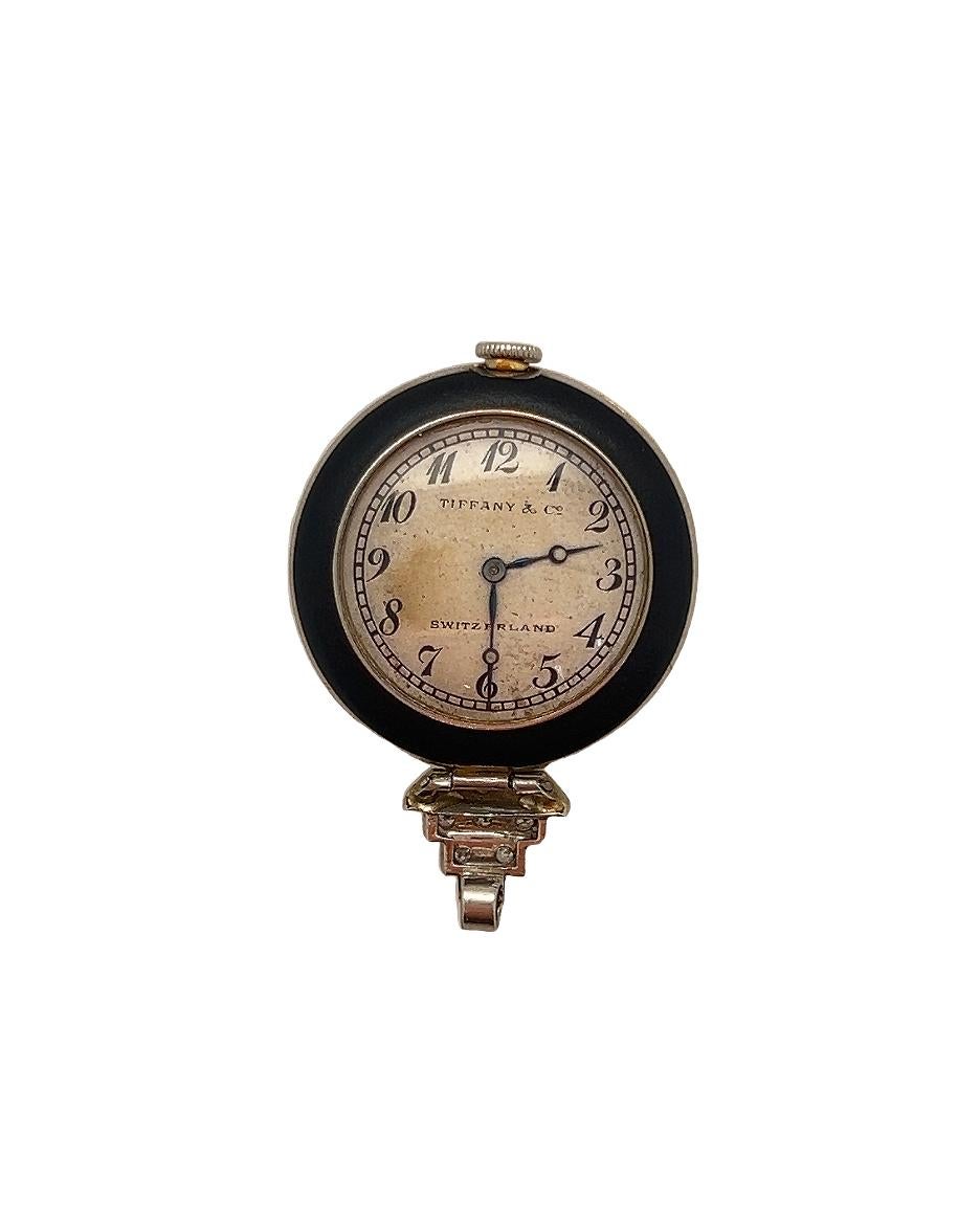 Beautifully reserved 1920s Tiffany & Co. watch pendant. 

Matt black onyx and diamonds. 

Watch is in working and is Swiss mechanism. 
