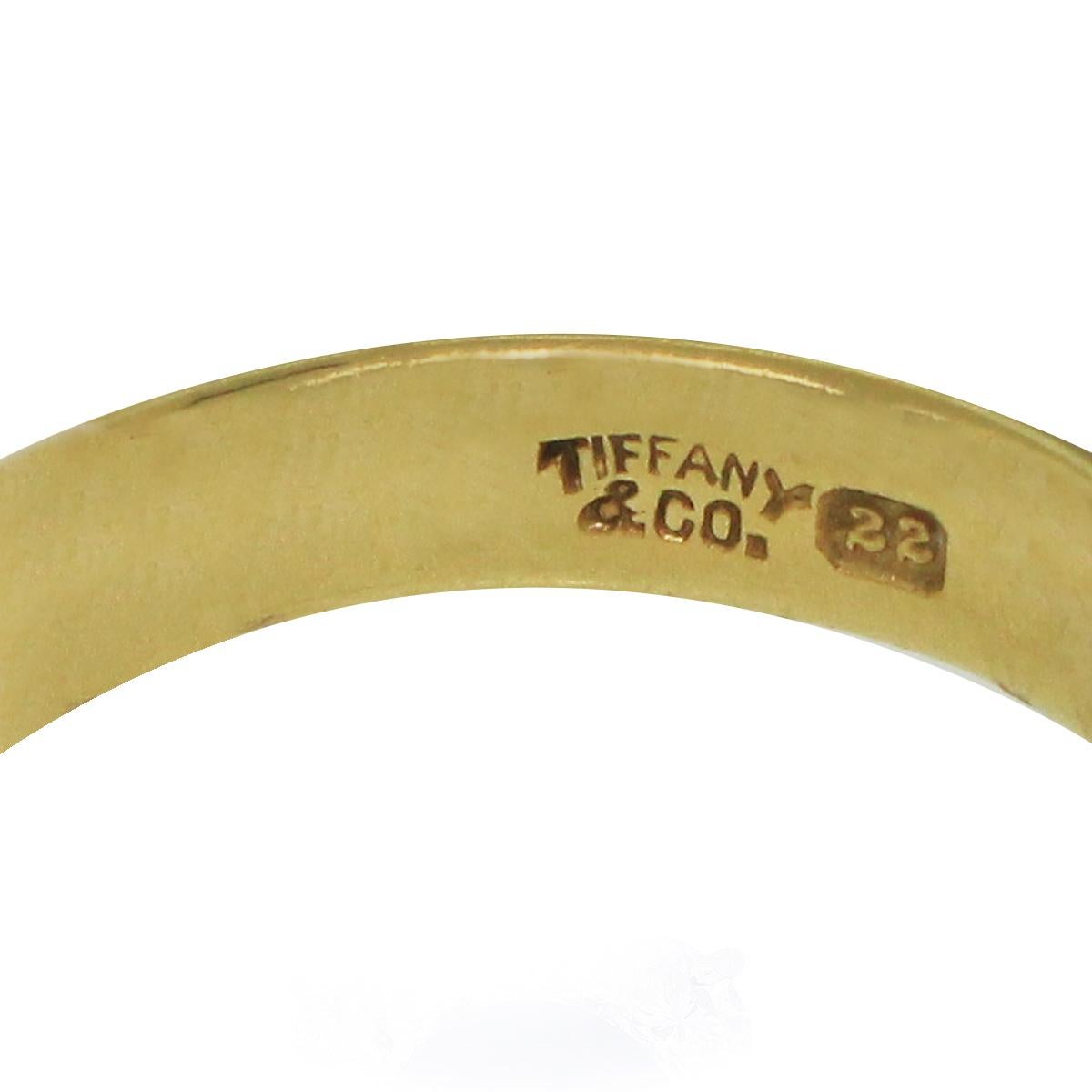 Brand: Tiffany & Co.
Material: 22k Yellow Gold
Ring Size: 6
Total Weight: 6.2g (4dwt)
Measurements: 0.89