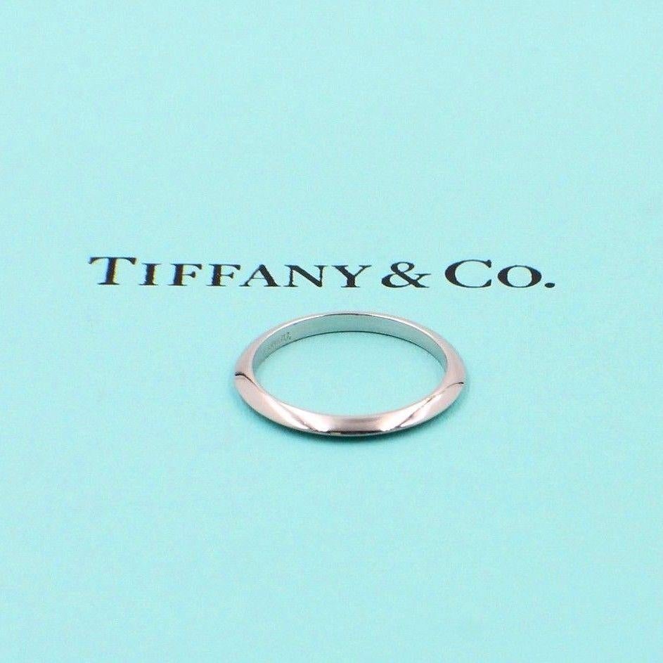 Tiffany & Co.
Style:  Wedding Band Ring
Sku Number:   11452515
Metal:  Platinum  PT950
Width:  2 MM
Size:  4.25
Hallmark:  TIFFANY&CO.PT950
Includes:  T&C Jewelry Pouch

Retail Replacement Value:  $675 + tax = $727.31