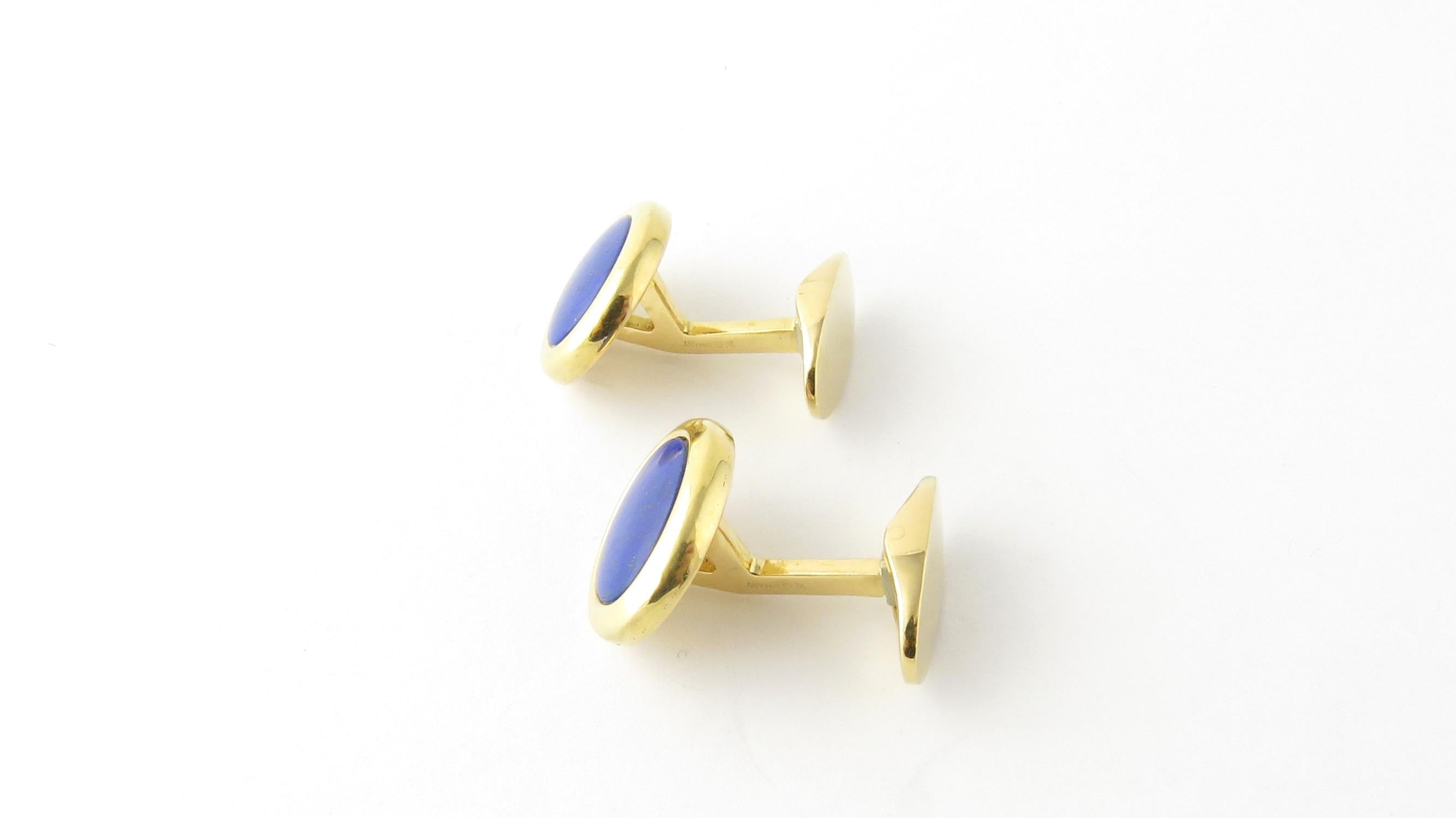 Tiffany & Co. West Germany 18K Yellow Gold Blue Lapis Cufflinks

These authentic Tiffany & Co. cufflinks are approx. 23 mm in length and 17 mm across at front

Stamped Tiffany & Co. 18K West Germany

10.9 dwt/ 17.0 g

Very good pre owned condition.