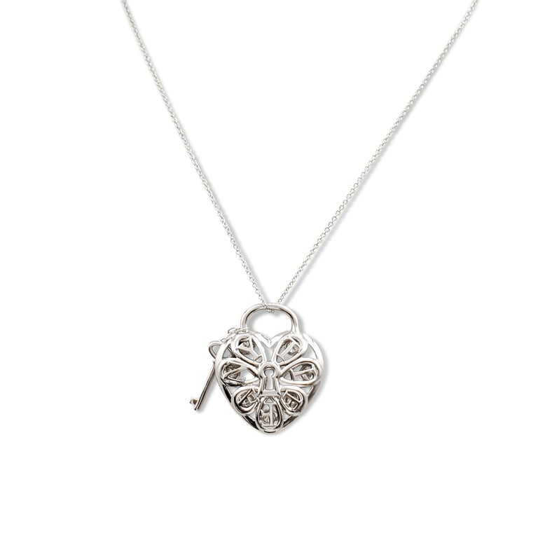 Tiffany and Co. White Gold and Diamond 'Filigree' Heart and Key Pendant ...