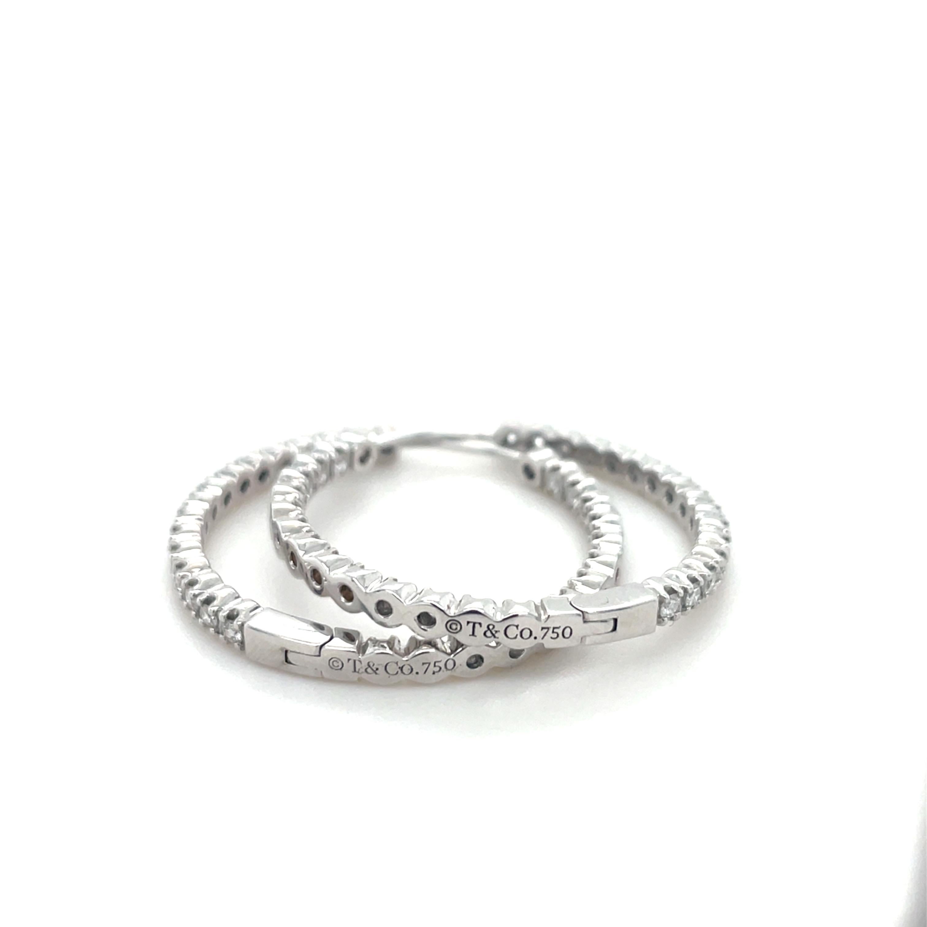 Tiffany & Co., White Gold and Diamond Hoop Earrings In Excellent Condition For Sale In Chicago, IL