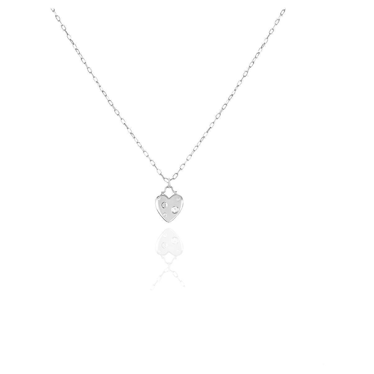 A charming 18k white gold diamond heart pendant by Tiffany & Co. from the Etoile collection. The pendant features a heart motif gypsy set with 5 round brilliant cut diamonds with an approximate weight of 0.10ct, F-G colour and VS clarity. The