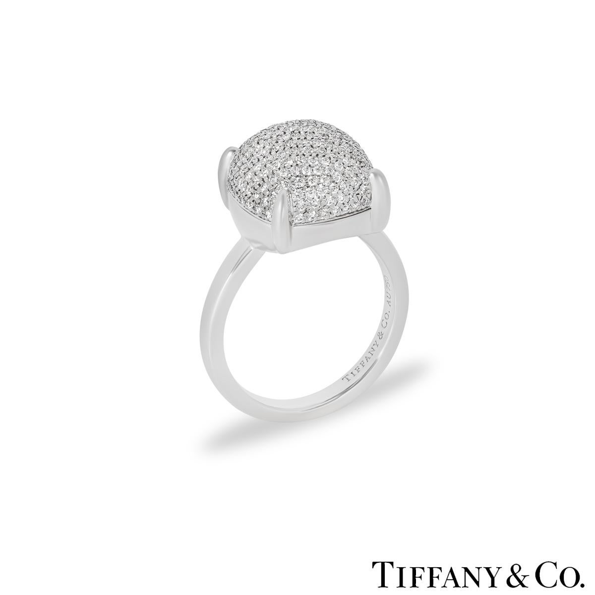 A sparkly 18k white gold diamond Sugar Stacks ring by Tiffany & Co. from the Paloma Picasso collection. The ring features a cushion shaped domed design pave set with 177 round brilliant cut diamonds with an approximate total weight of 0.53ct, F-G