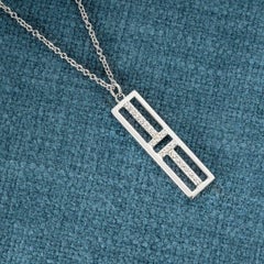 Tiffany & Co. White Gold Diamond T Pendant