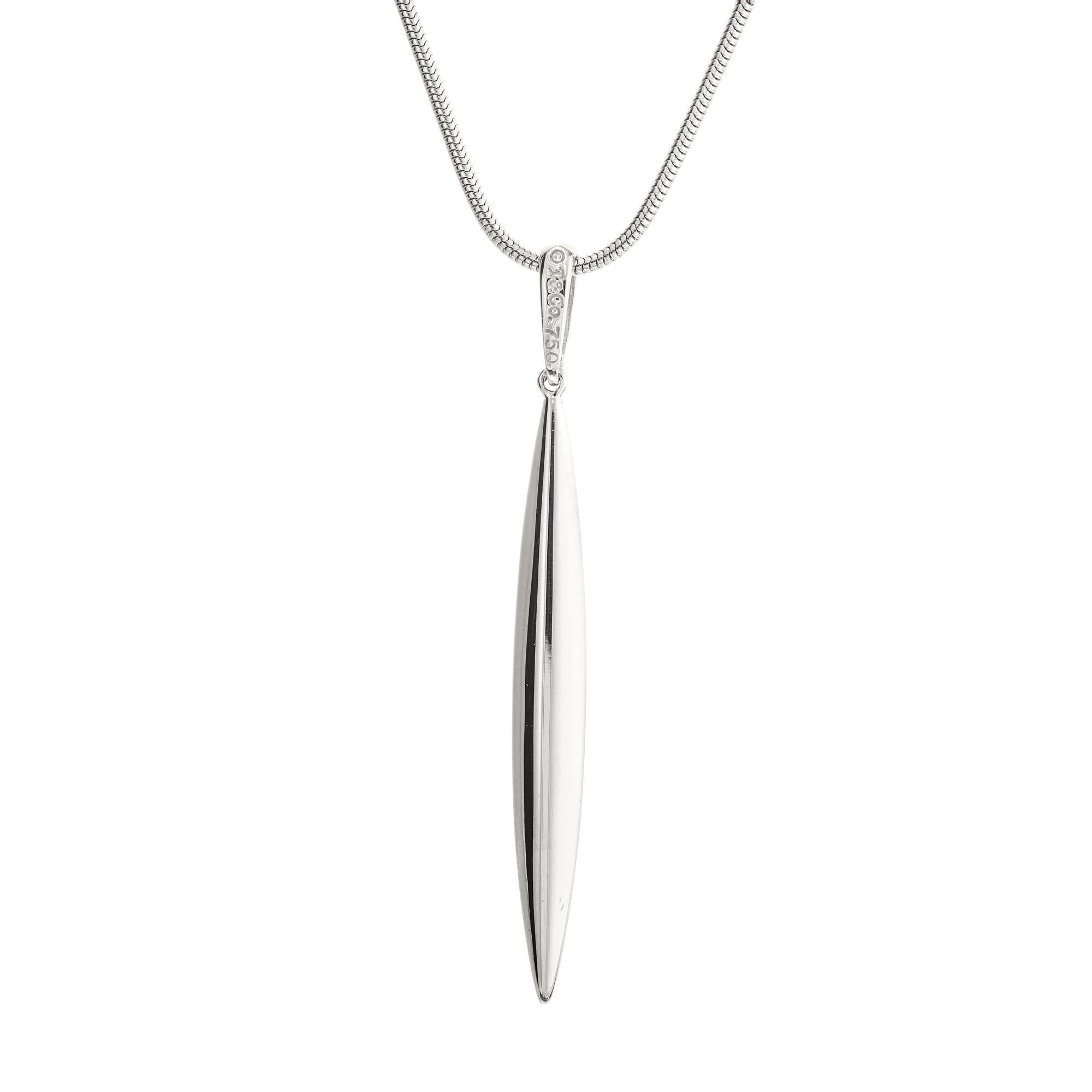 Tiffany and Co. 18k white gold feather pendant necklace in 18k white gold. 18k white gold 20 inch chain.

18k white gold 
Stamped: T + Co 750
Hallmark: T +Co
10.7 grams
Top to bottom: 50mm or 1 15/16 Inch
Width: 5mm or 3/16 Inch
Depth or thickness: