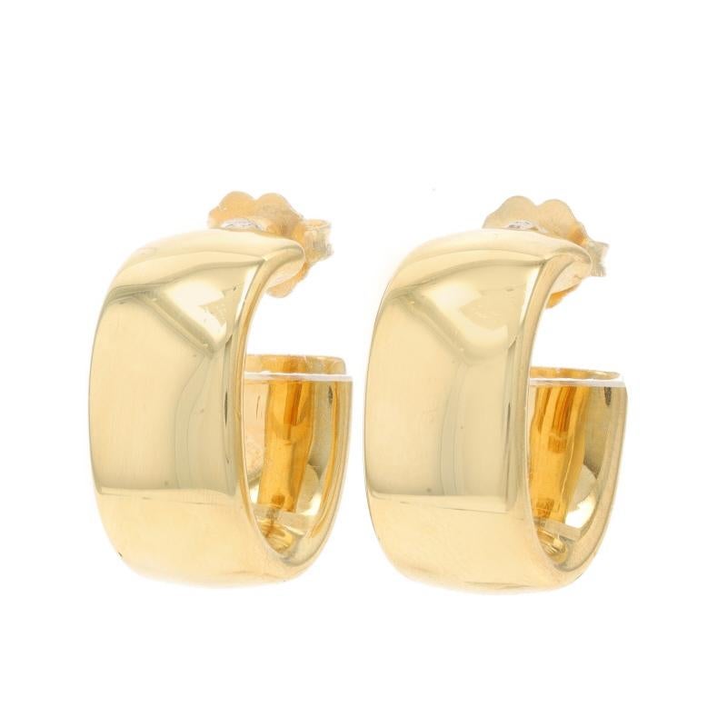 Metal Content: 18k Yellow Gold

Brand: Tiffany & Co.
Design:  Wide Hoop, backs not original

Style: Half-Hoop
Fastening Type: Butterfly Closures

Measurements

Tall: 17/32
