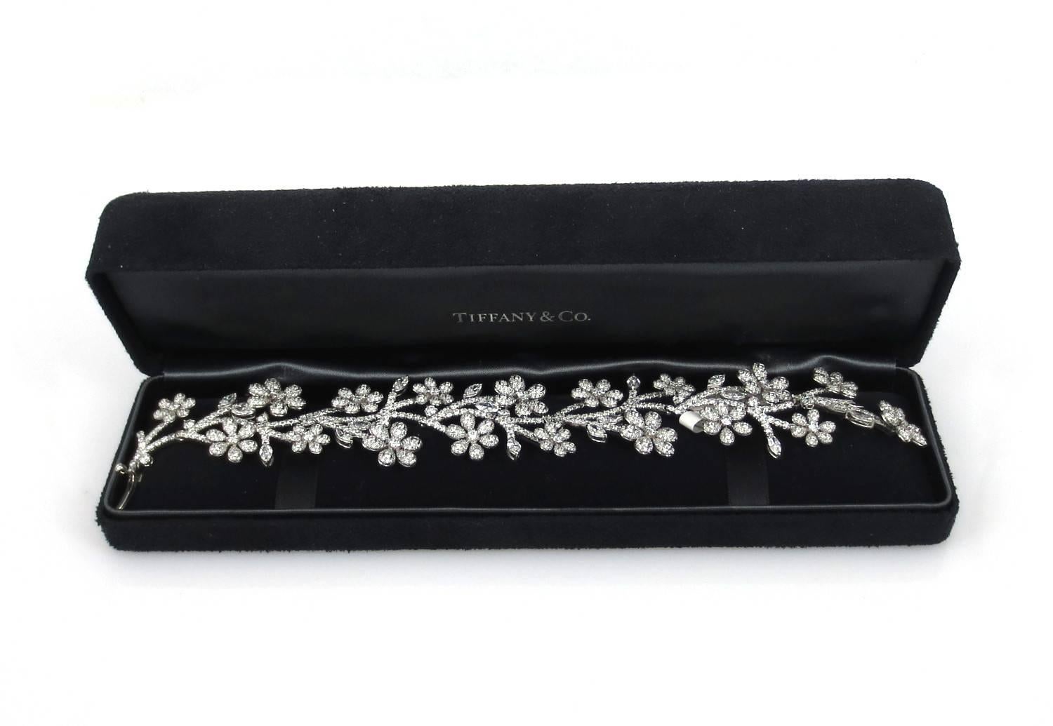 Stunning Tiffany & Co Wide Platinum Floral Estate Bracelet. Combination of Round Brilliant and Marquise Brilliant diamonds weighing approx. 30ct. Weight of the bracelet 76.5 Grams.