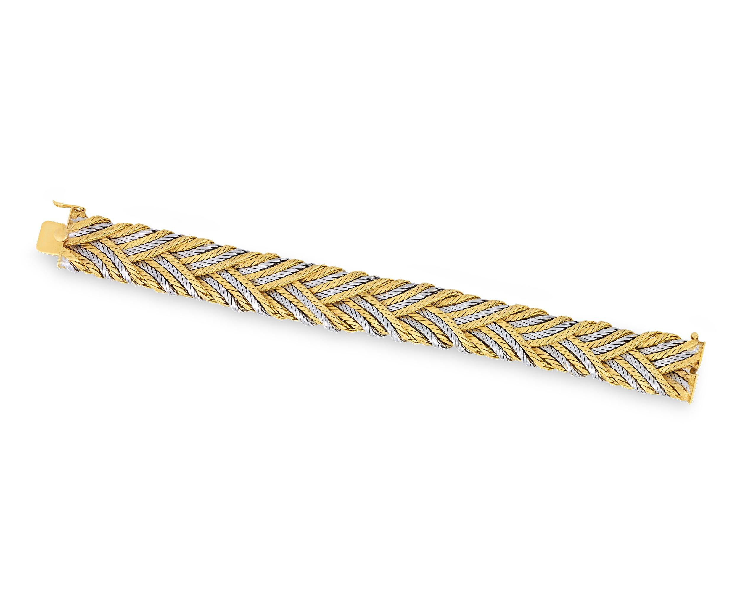 Featuring an enchanting woven design that moves elegantly across the wrist, this gold bracelet was designed by Buccellati for Tiffany & Co. Combining the warmth of 18K yellow gold with the cool tones of 18K white gold, the bi-color bracelet