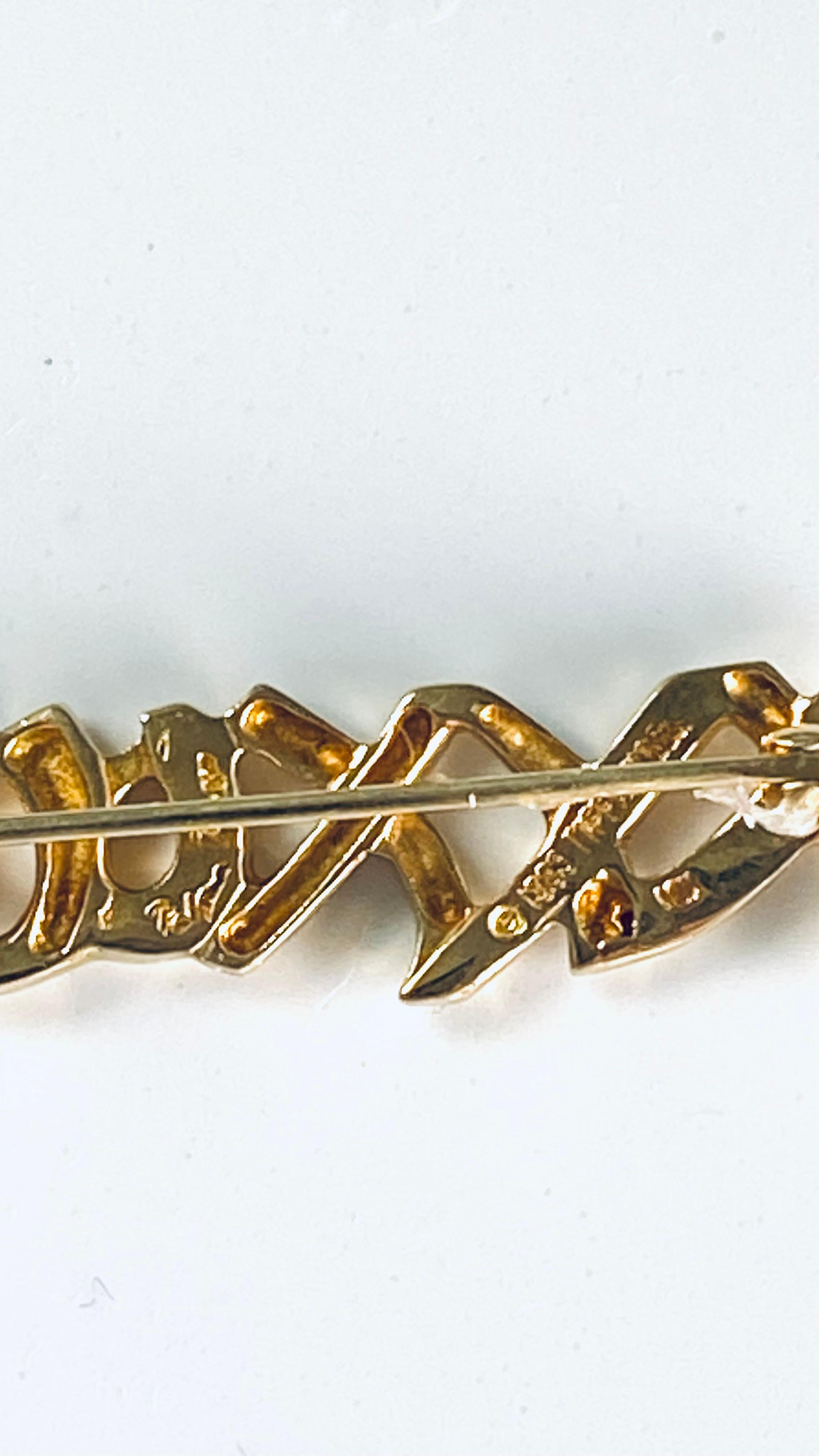 Broche vintage de oro amarillo de 18 quilates 