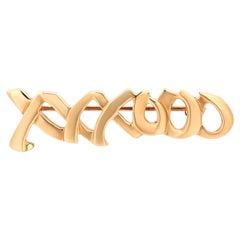 Broche vintage de oro amarillo de 18 quilates "XOXOXO" de Tiffany Co - Circa 1983