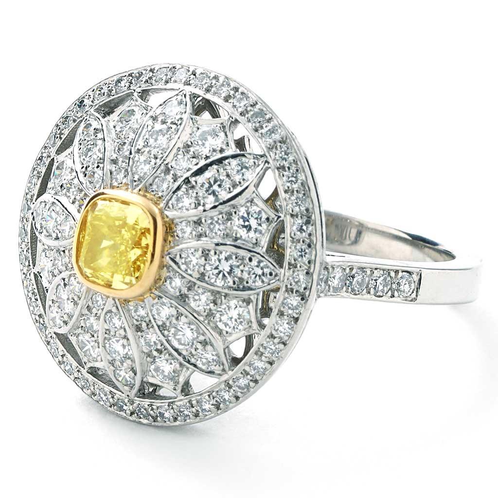 The ring is a size 6 (US), made of 18K yellow gold and platinum, and weighs 5.10 DWT (approx. 7.93 grams). It also has one cushion cut Fancy Yellow diamond, and 100 round diamonds.
Tiffany Style Number 29959676