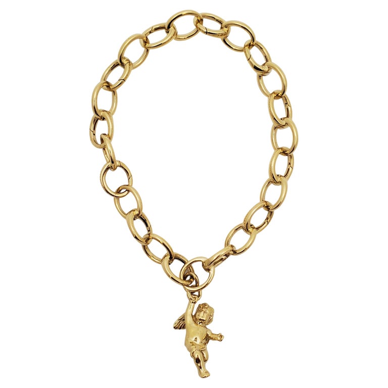 Tiffany and Co. Yellow Gold Charm Bracelet with Cherub Charm at 1stDibs
