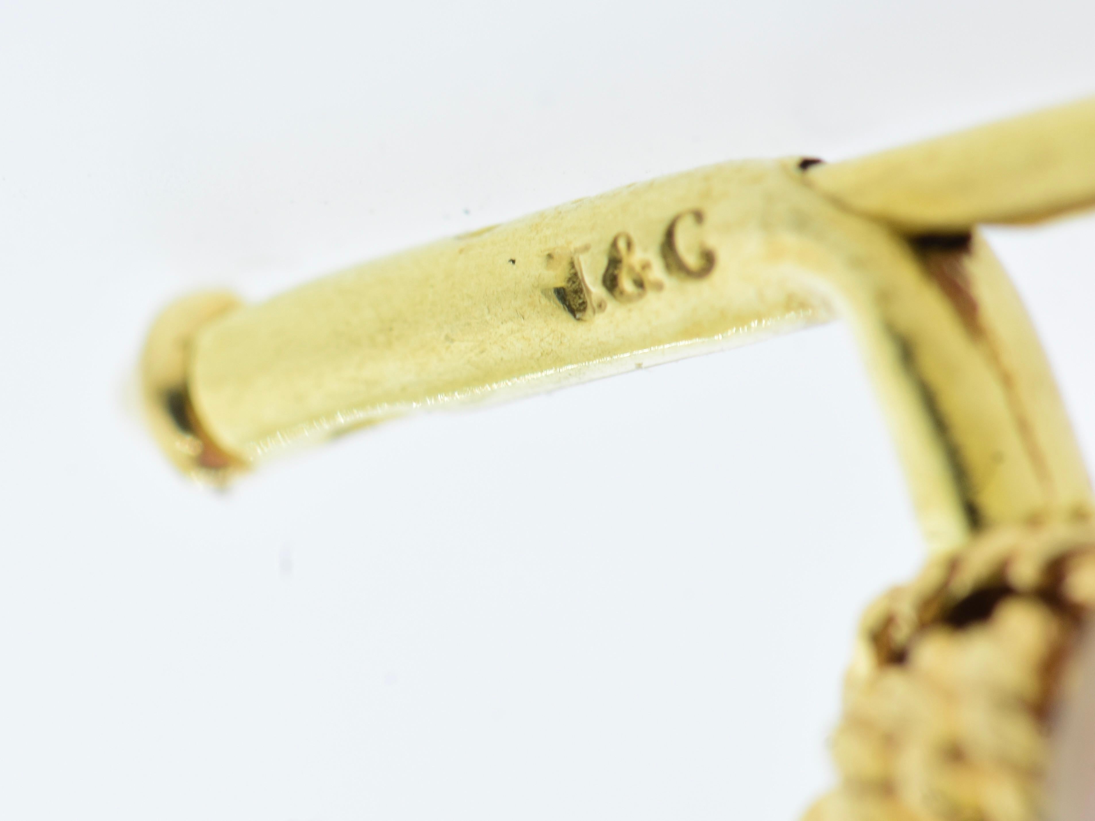 Tiffany & Co. Ensemble manchette et clous en or jaune à motif de nœud d'amour, vintage, vers 1970 en vente 6