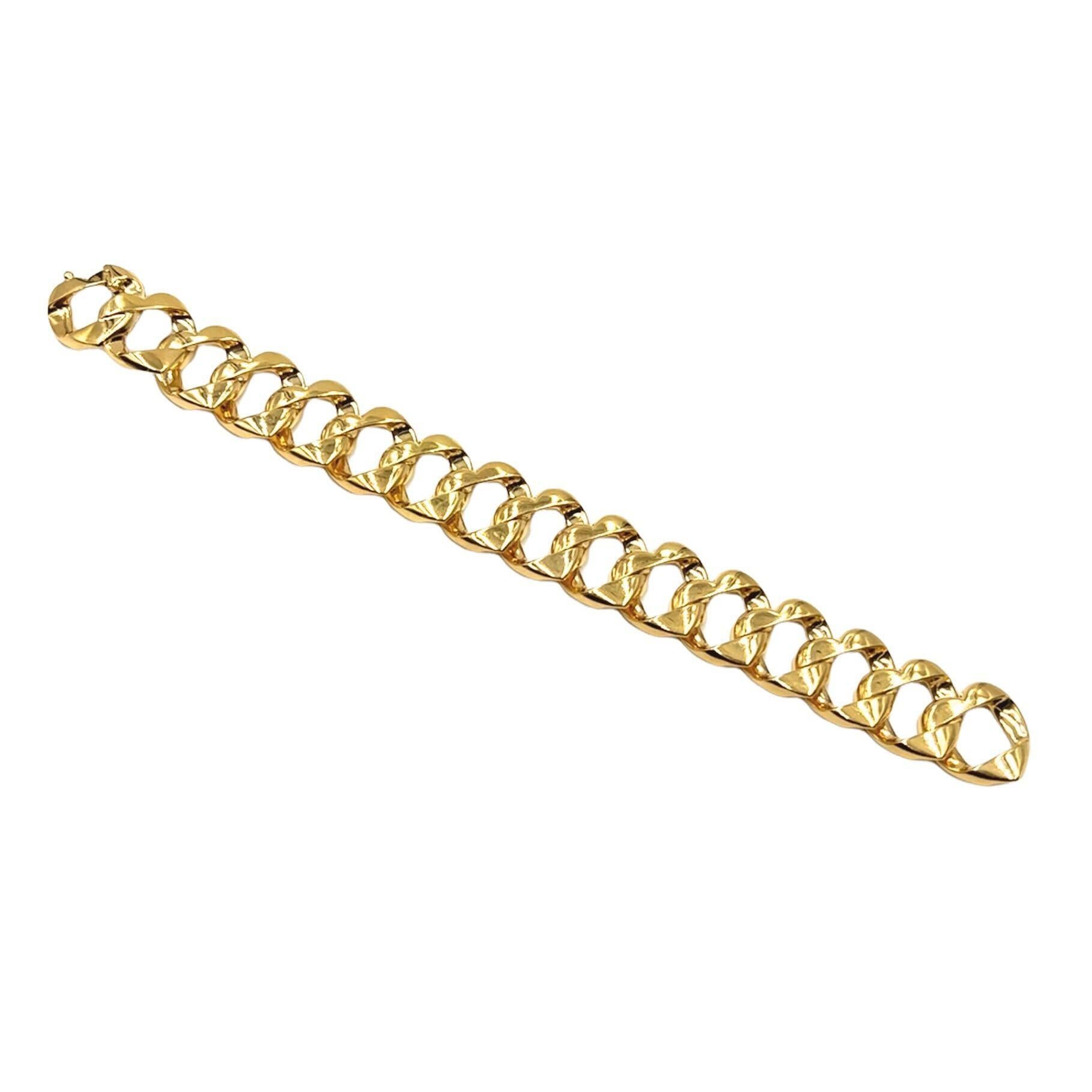 An 18 karat yellow gold bracelet, Tiffany & Co.  The bracelet formed as a length of heart shaped curb links.  Lenght approximately 9 1/4 inches.  Gross weight approximately 115.10 grams.  Signed Tiffany & Co.
