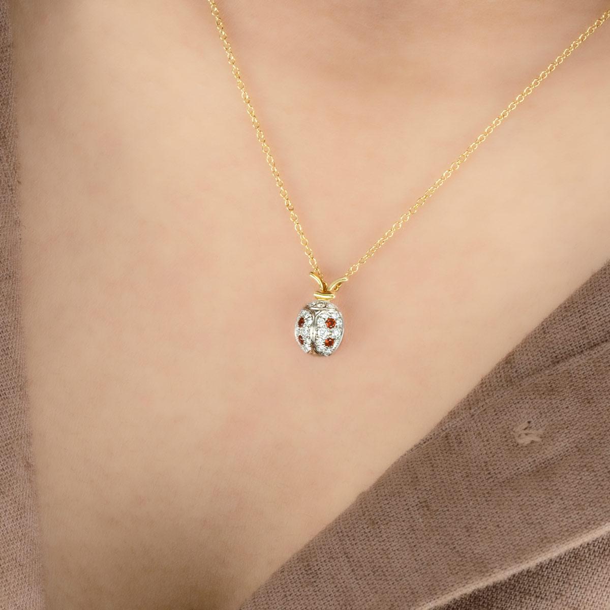 Round Cut Tiffany & Co. Yellow Gold Diamond and Garnet Schlumberger Ladybug Pendant
