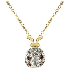 Tiffany & Co. Yellow Gold Diamond and Garnet Schlumberger Ladybug Pendant