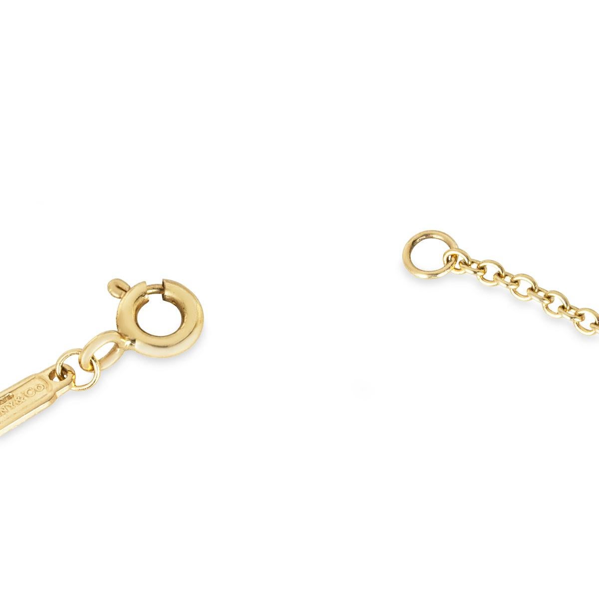 Tiffany & Co. Yellow Gold Diamond Bag Pendant 0.34ct TDW For Sale 1
