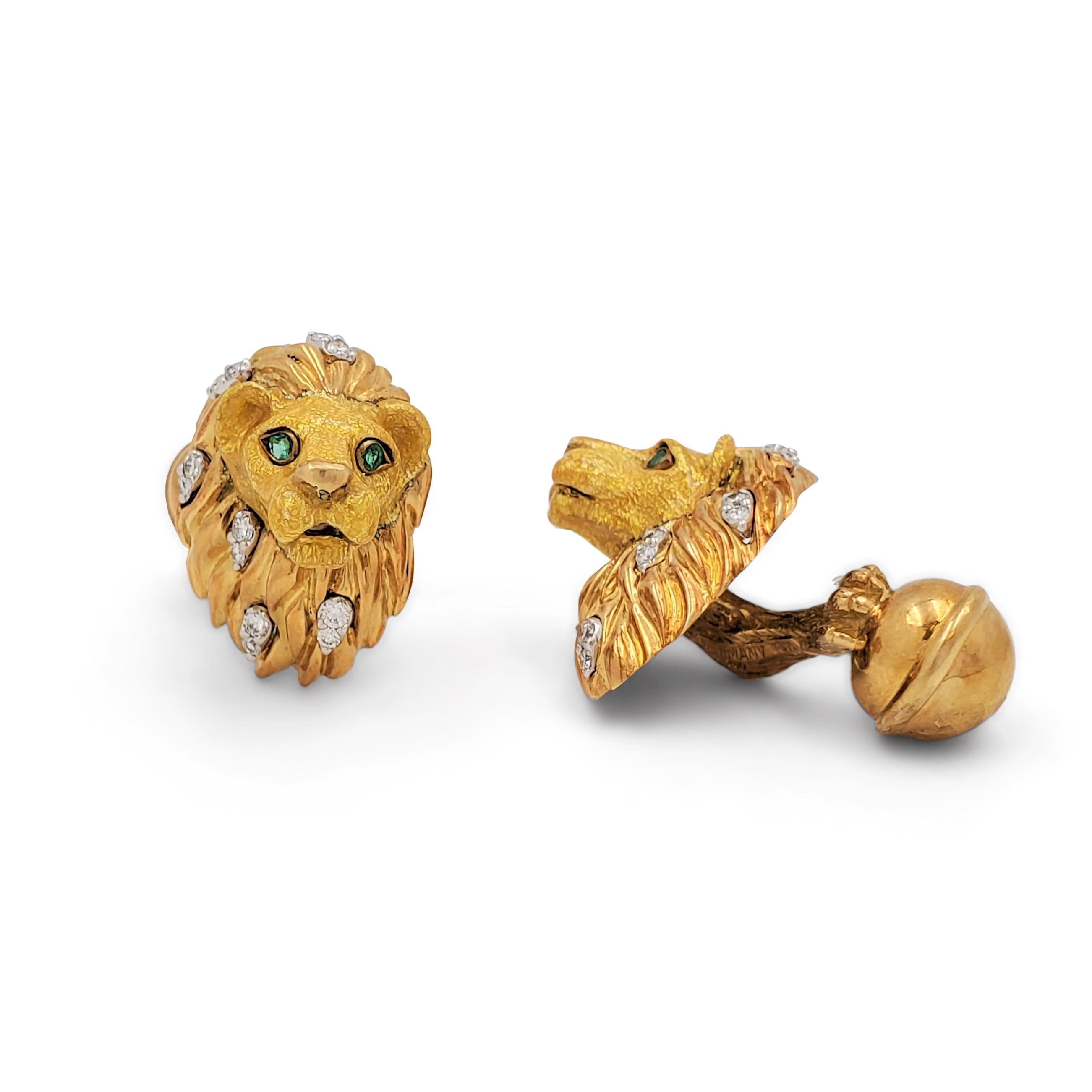 Authentic Tiffany & Co. cufflinks crafted in 18 karats Yellow Gold and Emerald. Designed in the shape of a lion's head, the majestic mane of each lion is set with 12 round brilliant cut diamonds, weighing an estimated 0.96 carats, total. The eyes