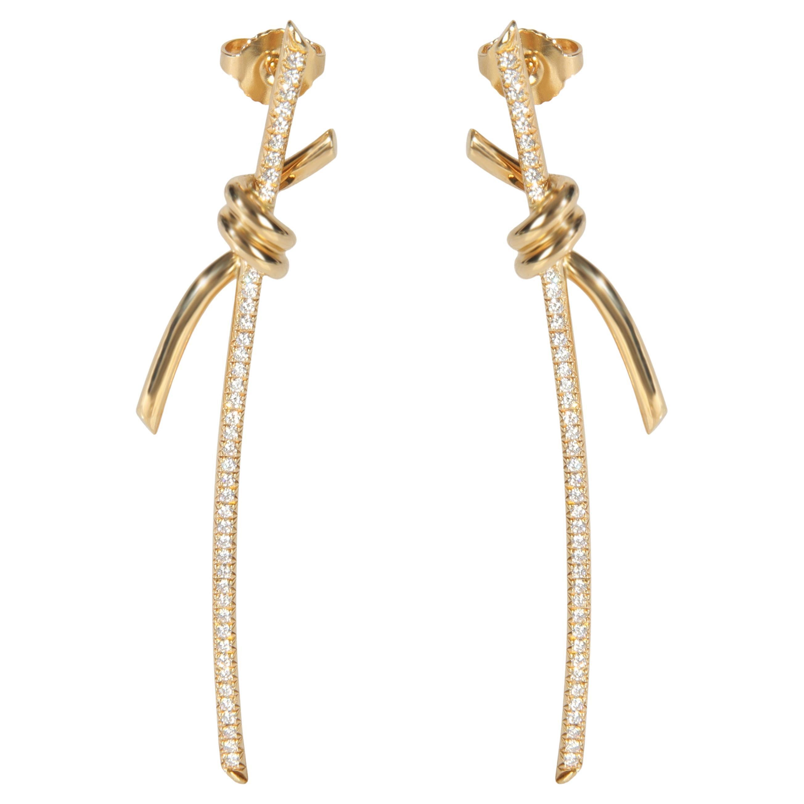 Tiffany 
Co. Orecchini a goccia con nodo di diamanti in oro giallo in vendita