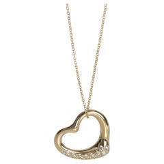 Tiffany & Co. Ciondolo a cuore aperto con diamante in oro giallo