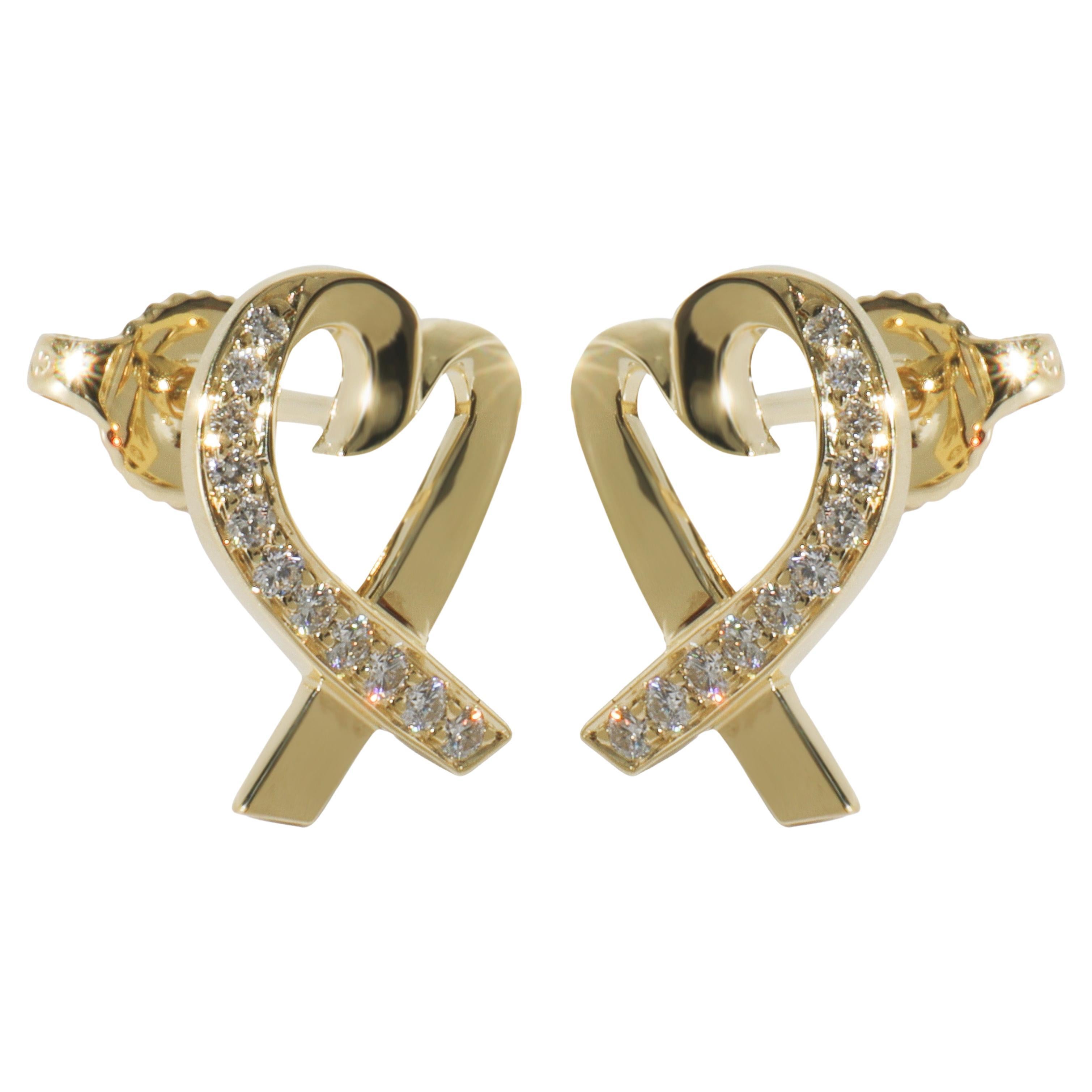 Tiffany
Co. Boucles d
oreilles en or jaune avec diamants Paloma Picasso Loving Heart