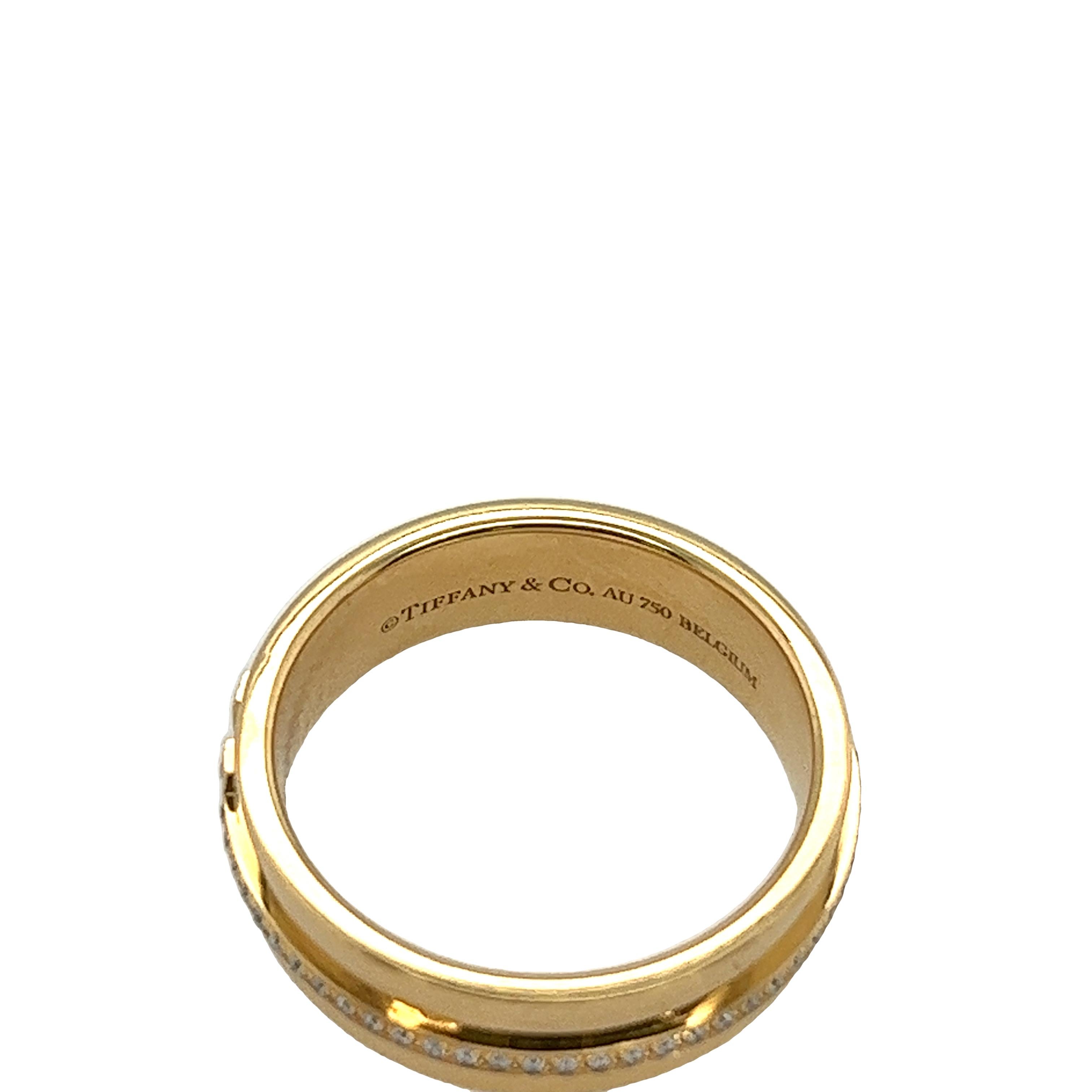 Women's or Men's Tiffany & Co. Yellow Gold diamond T narrow Ring- With original box For Sale