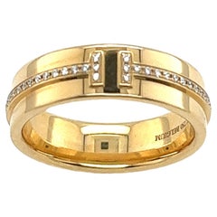 Tiffany & Co. Bague étroite en or jaune diamantée T avec boîte d'origine