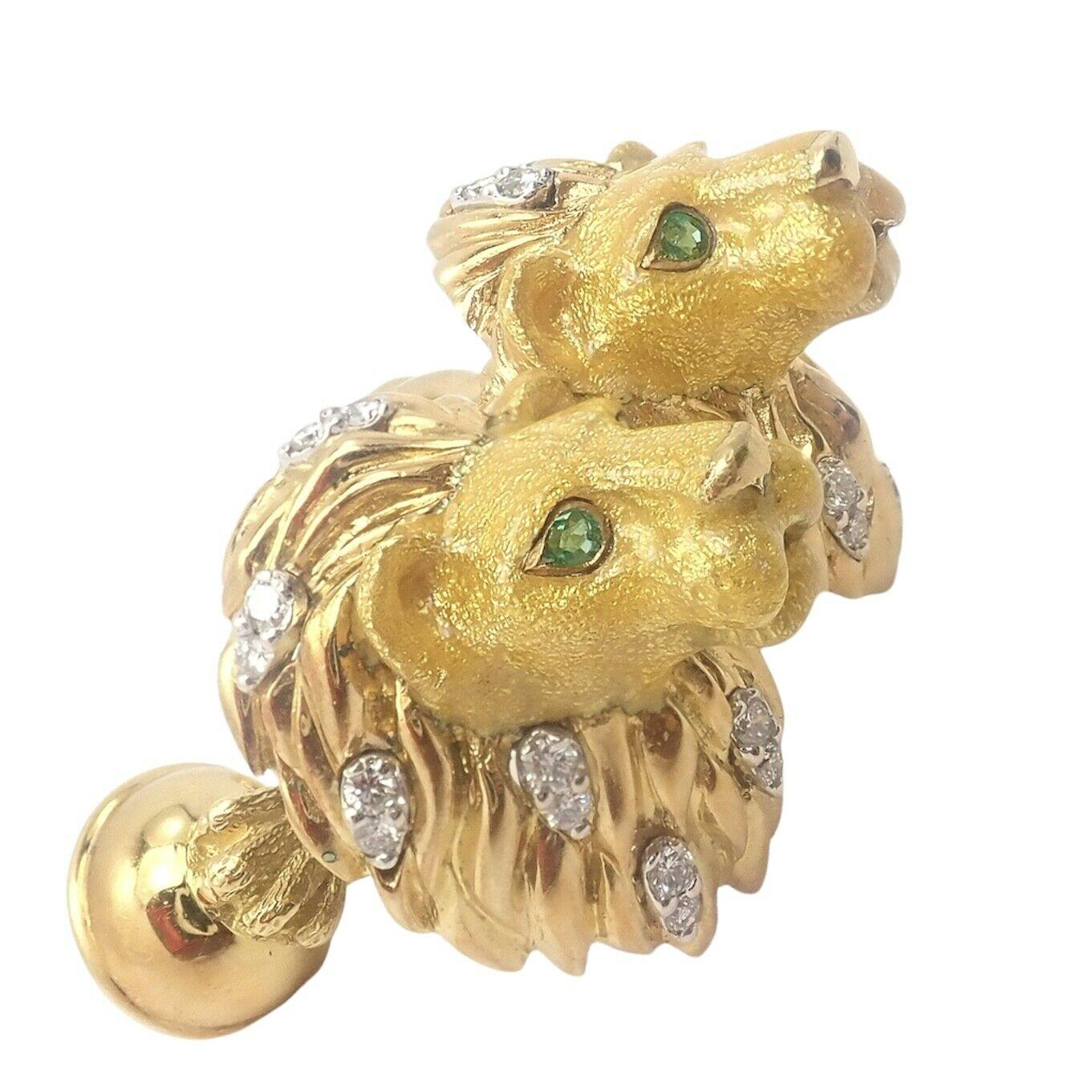 18k Yellow Gold Lion Head Cufflinks from Tiffany & Co. Germany. 
4 emerald eyes. 
24 diamonds, VVS2/G Color or Better, Approx 0.70ctw
Golden Yellow Enamel Face
These Tiffany & Co. cufflinks are rare and retired. 

Details: 
Weight: 22.3