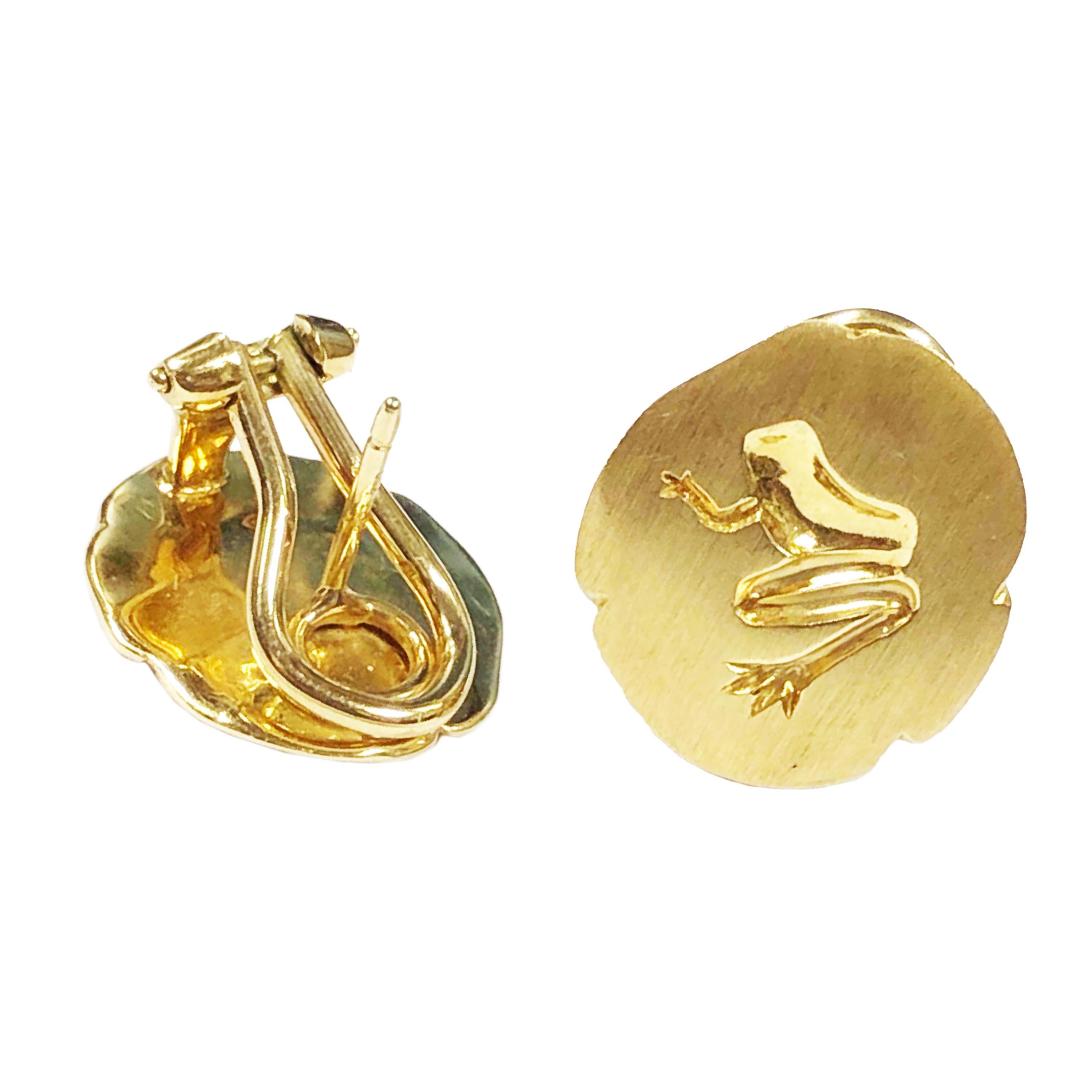 Circa 2000 Tiffany & Company 18K Yellow Gold Earrings having an impressed Intaglio Frog on a Lillipad. Measuring 5/8 X 5/8 inch and having an Omega back with a post.