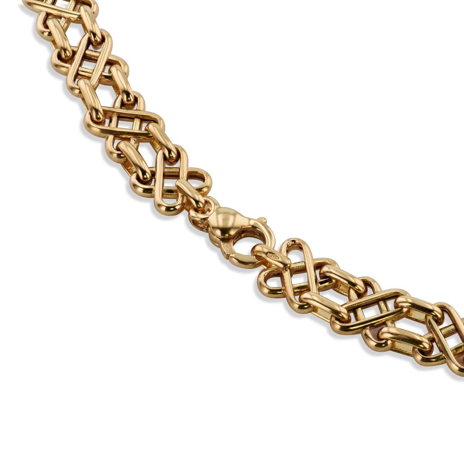  Enjoy this previously loved Tiffany & Co. 18 karat yellow gold geometric design necklace measuring 17 inches.