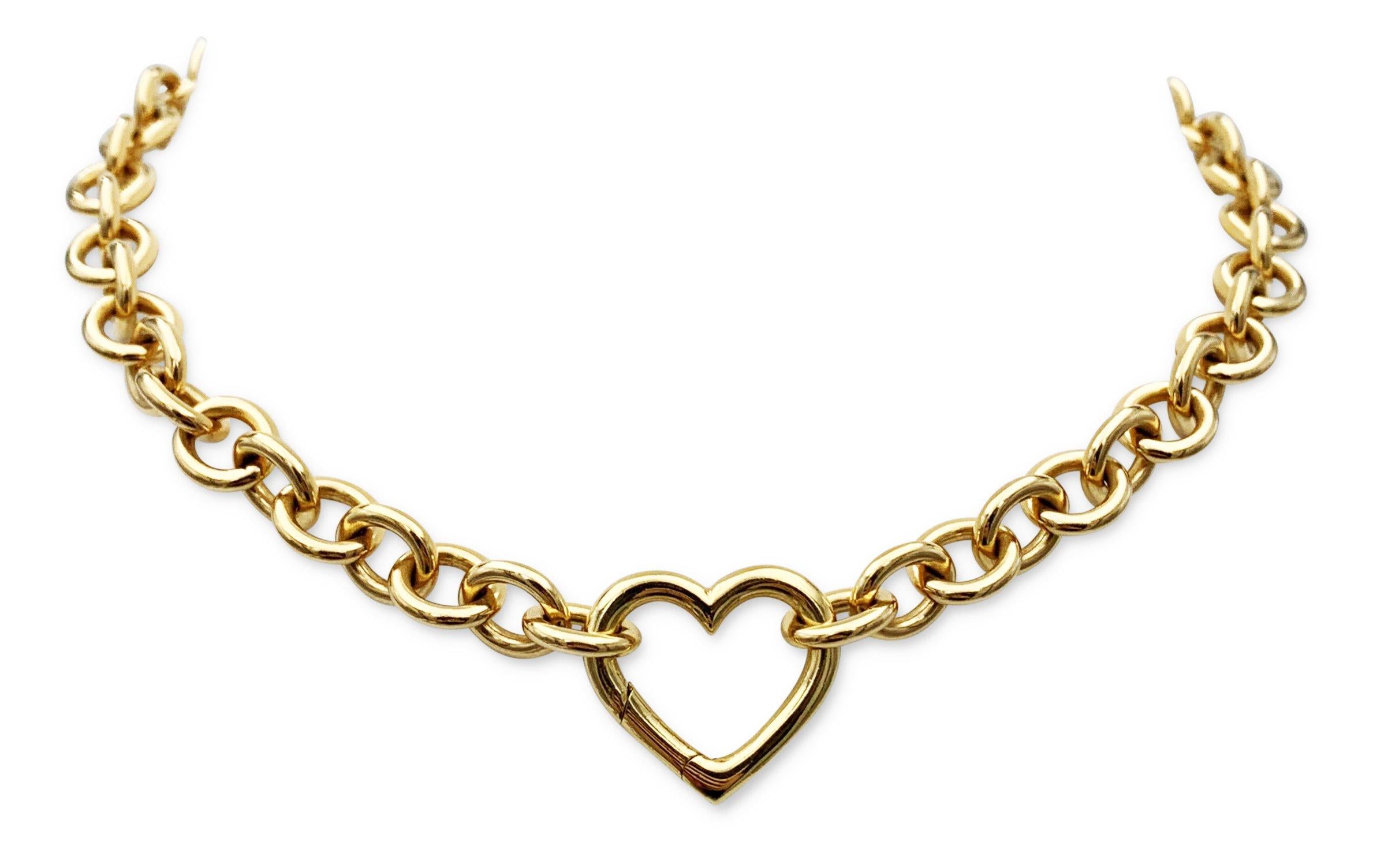 Authentic Tiffany & Co. necklace crafted in 18 karat yellow gold features an open heart pendant clasp. Signed Tiffany & Co., 750. The necklace measures 15 3/4 inches in length. Presented with the original box, no papers. CIRCA 2000s. 