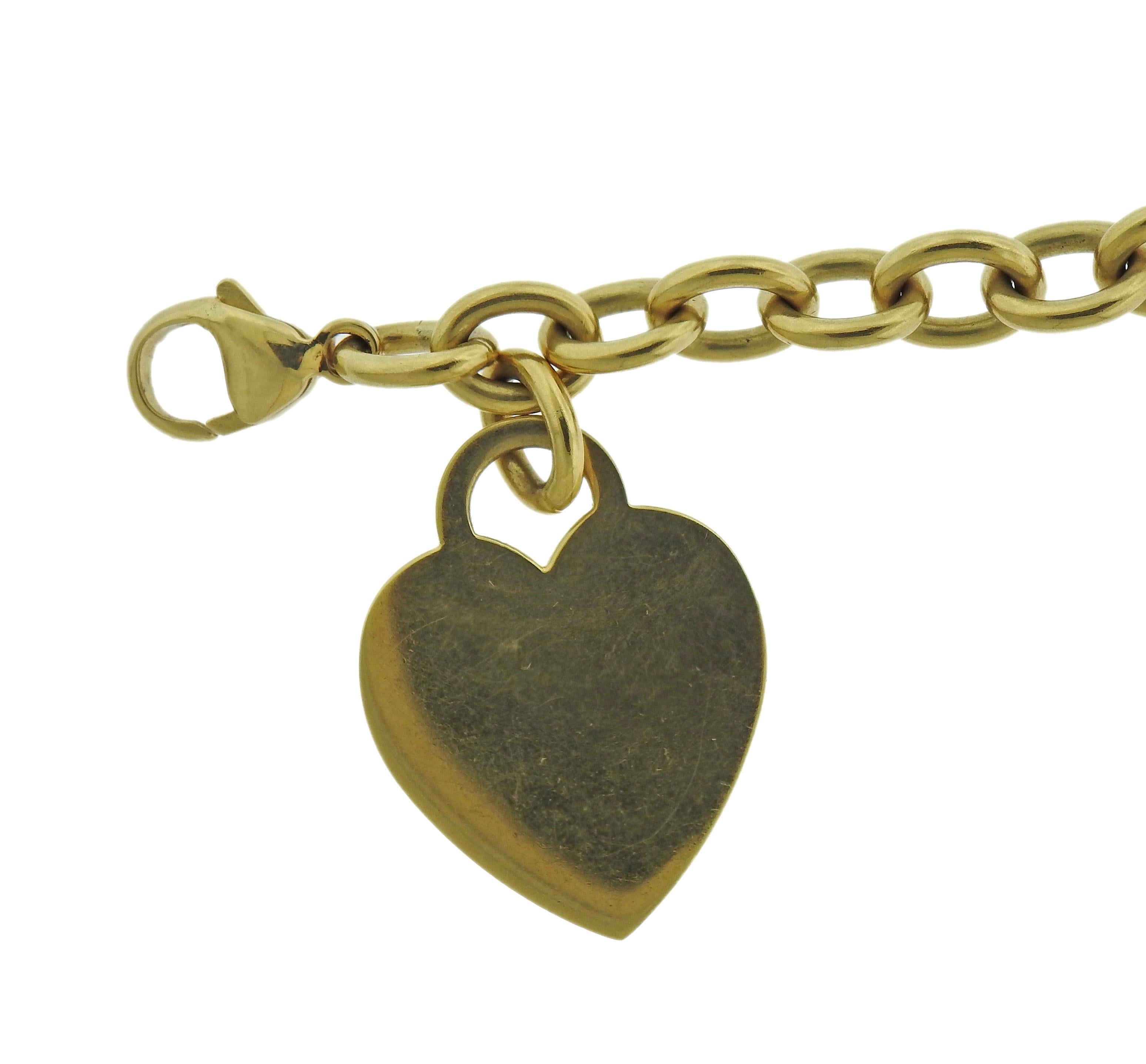 Signature 18k Gelbgold Armband von Tiffany & Co mit Herzanhänger. Das Armband ist 7,5