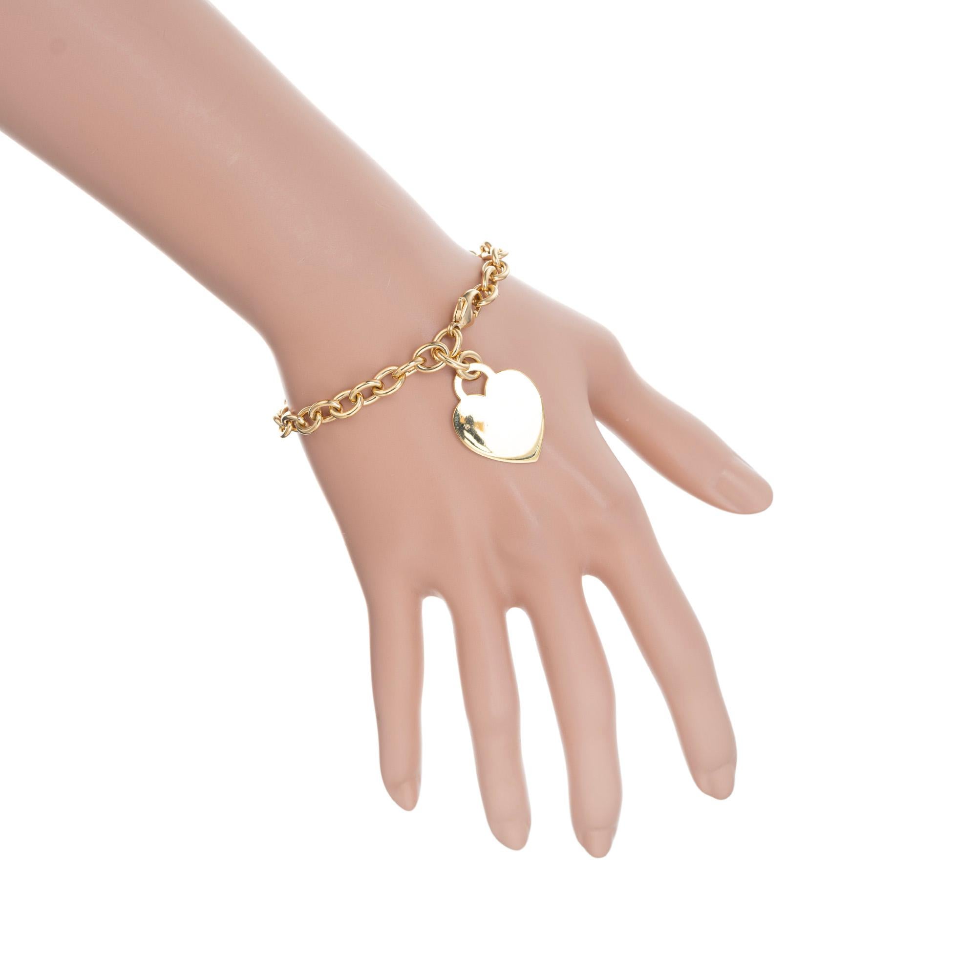 Tiffany & Co Yellow Gold Heart Tag Charm Bracelet In Good Condition In Stamford, CT